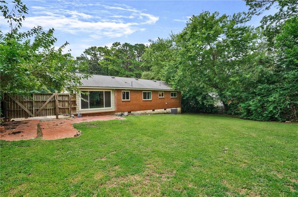 3225 Spring Drive Northwest Atlanta, GA 30360 - Photo 26 of 28 a front view of house with yard and green space