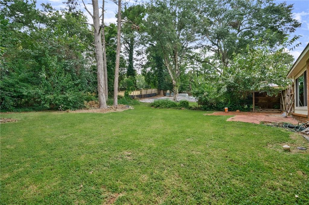 3225 Spring Drive Northwest Atlanta, GA 30360 - Photo 27 of 28 a view of a backyard with large trees