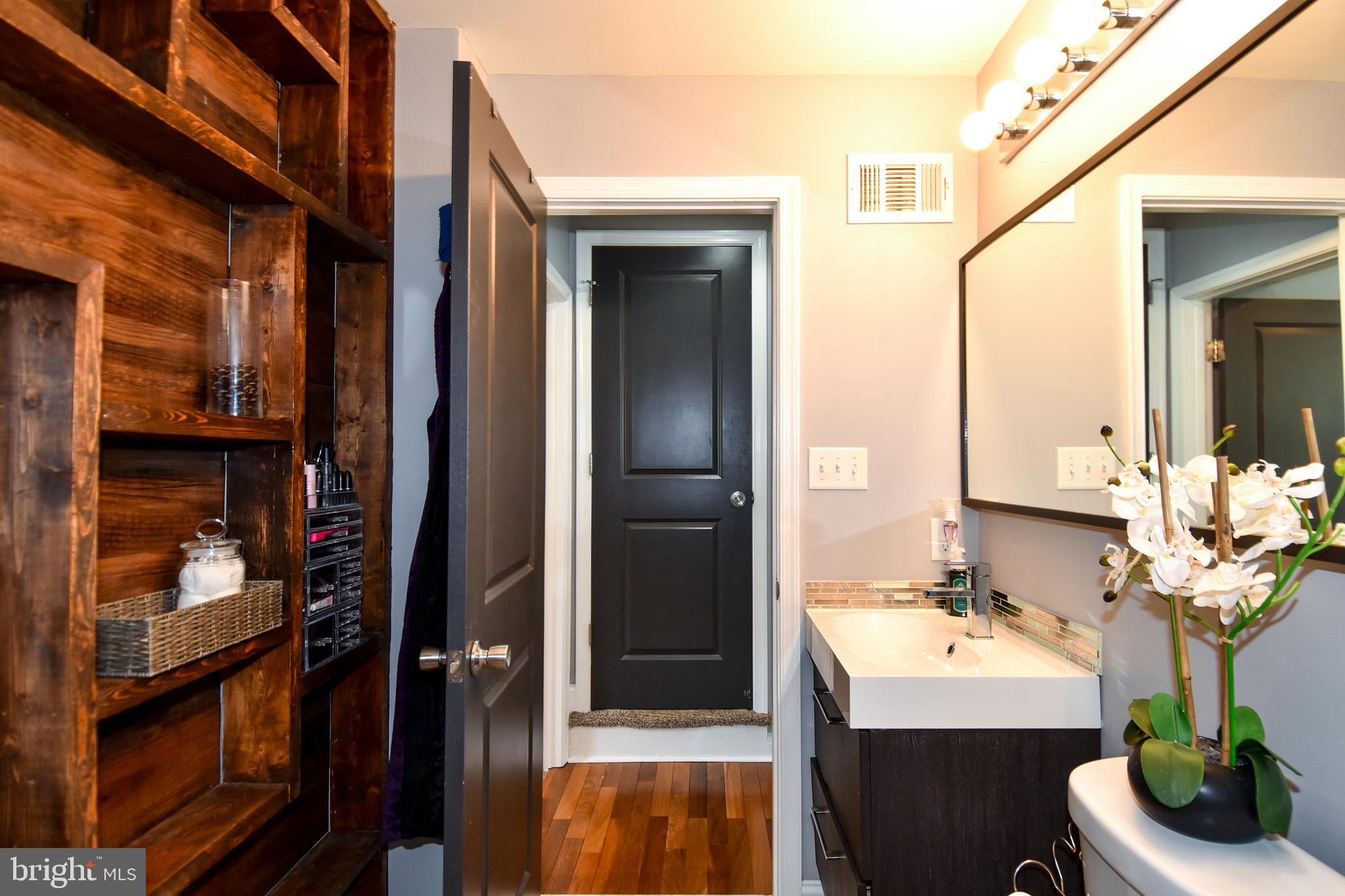 3831 Byfield Road Baltimore, MD 21207 - Photo 14 of 40 MAIN LEVEL FULL BATH