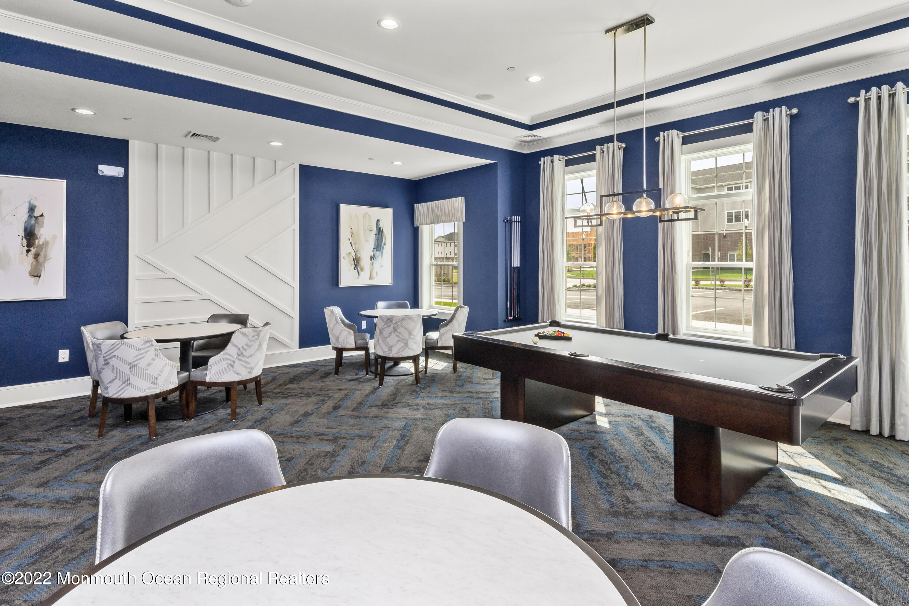 2302 Jamison Road Monroe Township, NJ 08831 - Photo 16 of 18 a living room with furniture a rug and a large window