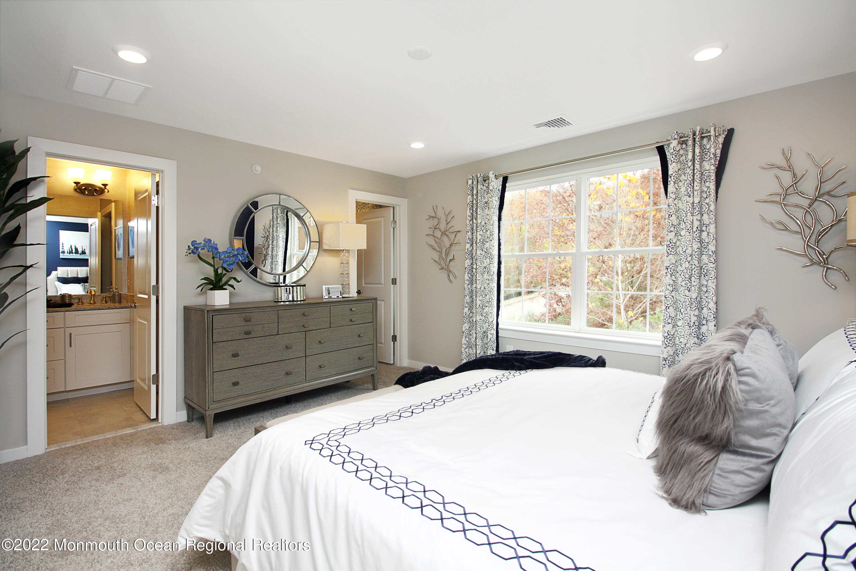 2302 Jamison Road Monroe Township, NJ 08831 - Photo 7 of 18 a bedroom with a bed and a dresser