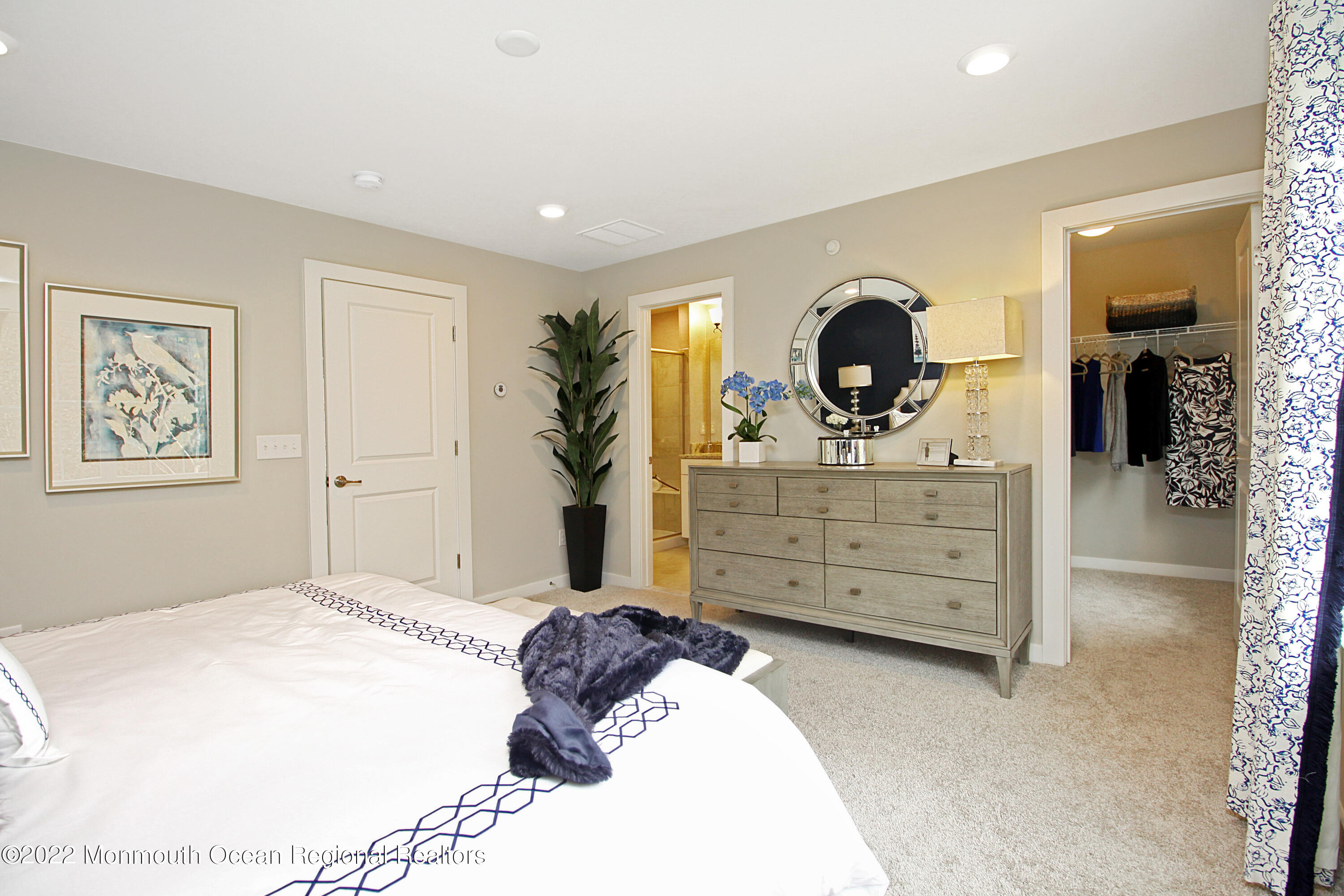 2302 Jamison Road Monroe Township, NJ 08831 - Photo 8 of 18 a bedroom with a bed and a dresser