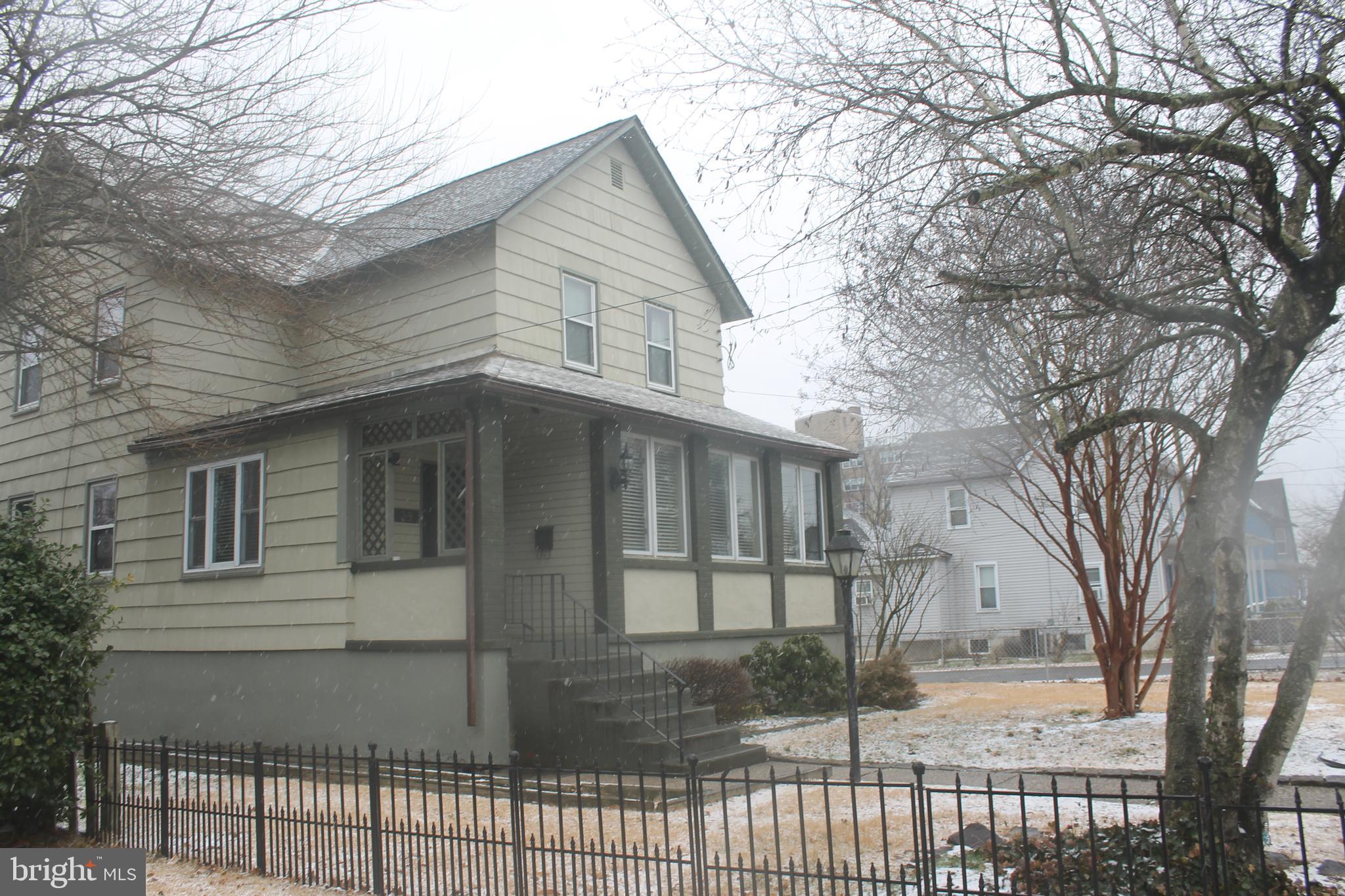 29 Lincoln Avenue Clementon, NJ 08021 - Photo 1 of 36 a view of a white house with a large tree