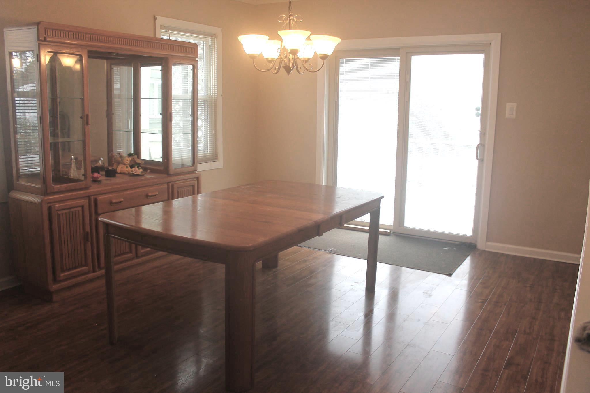 29 Lincoln Avenue Clementon, NJ 08021 - Photo 17 of 36 a view of a dining room with furniture and window