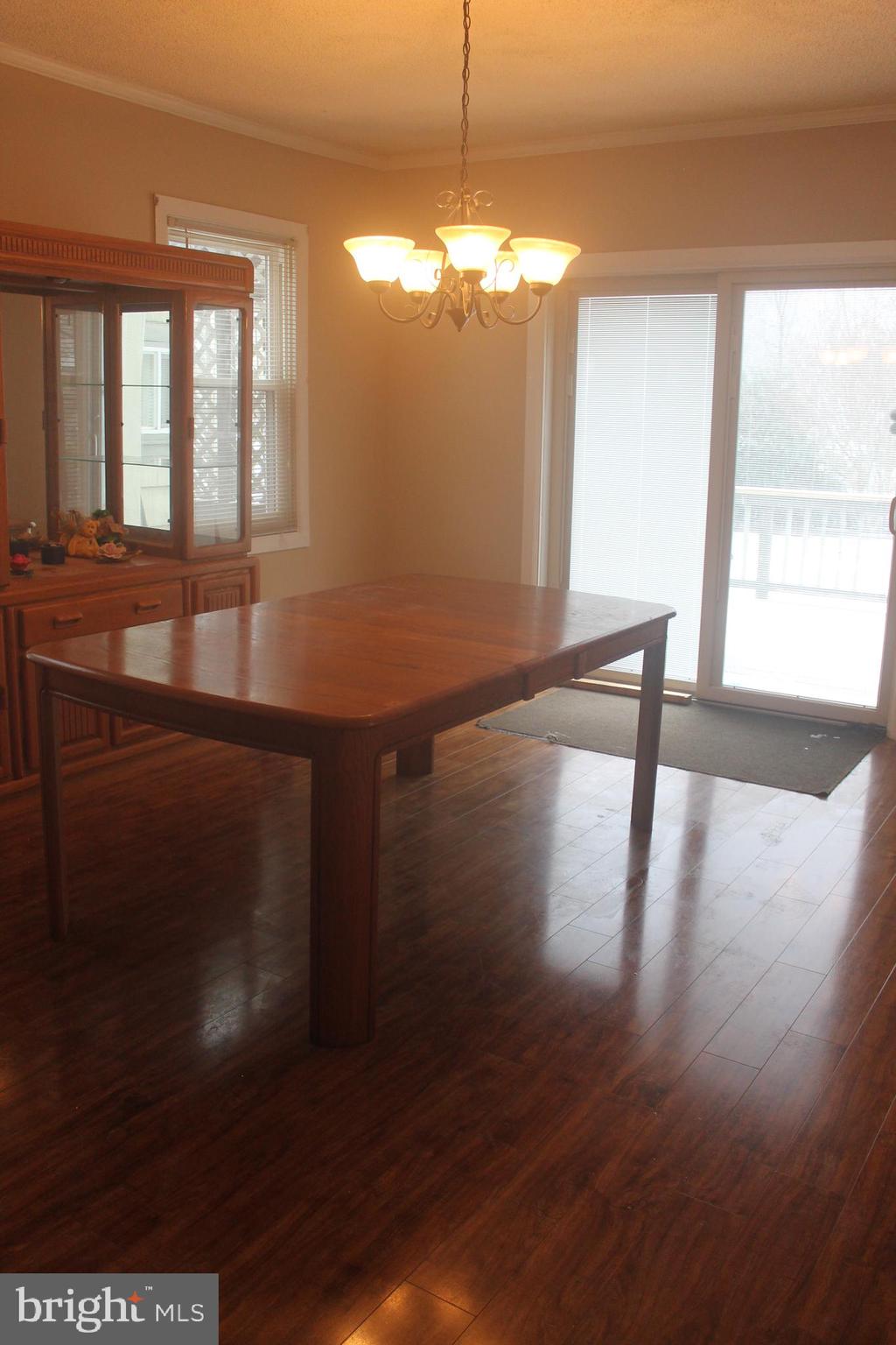29 Lincoln Avenue Clementon, NJ 08021 - Photo 18 of 36 a view of a room with wooden floor and windows