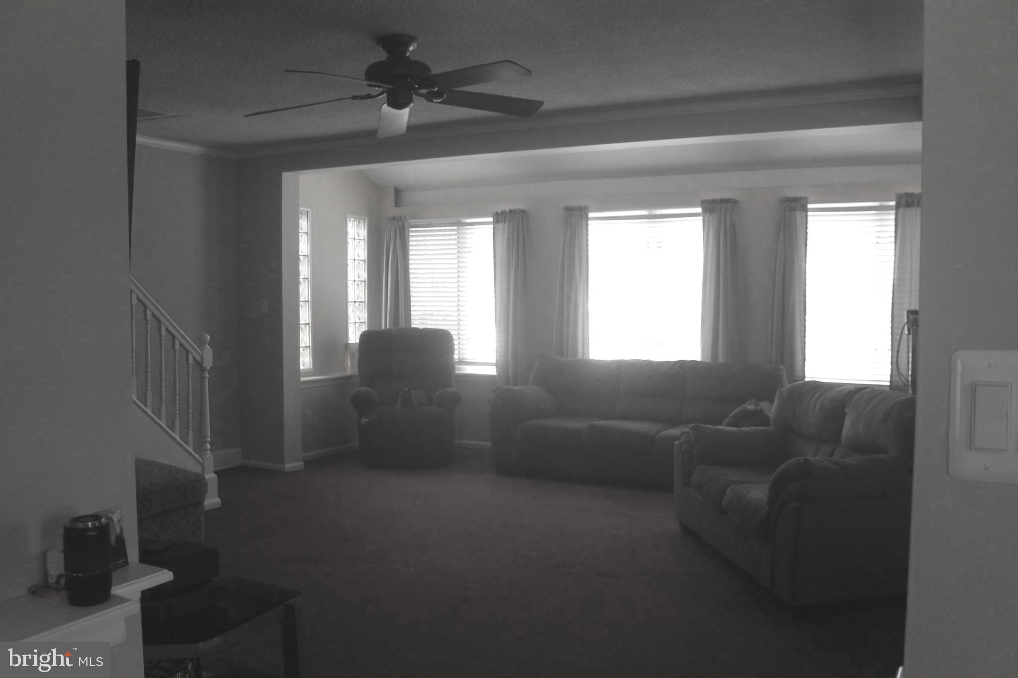 29 Lincoln Avenue Clementon, NJ 08021 - Photo 19 of 36 a living room with furniture and a window