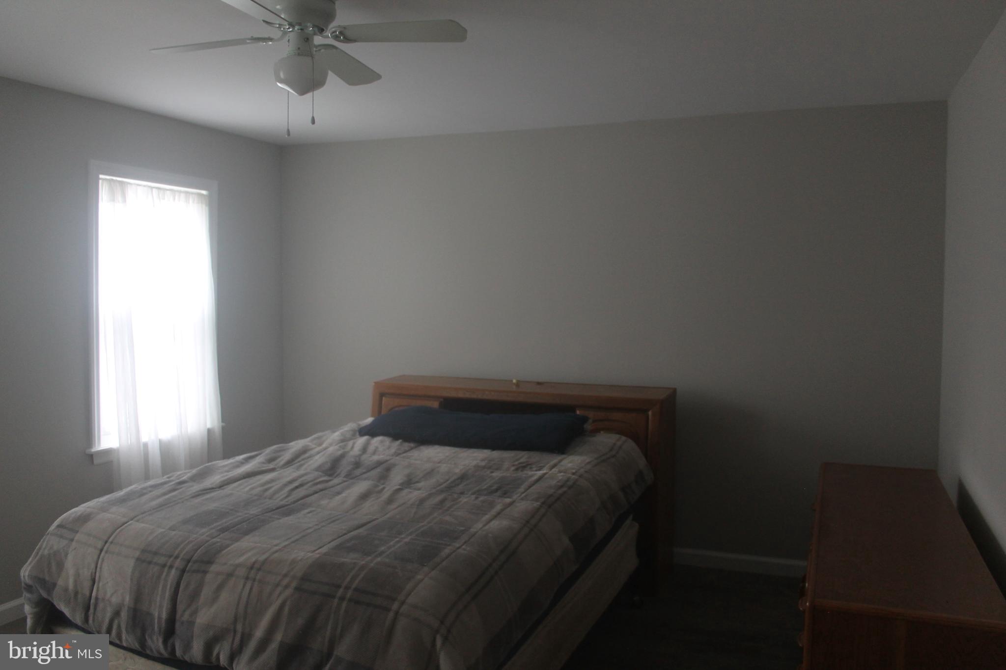 29 Lincoln Avenue Clementon, NJ 08021 - Photo 29 of 36 a bedroom with a bed and window