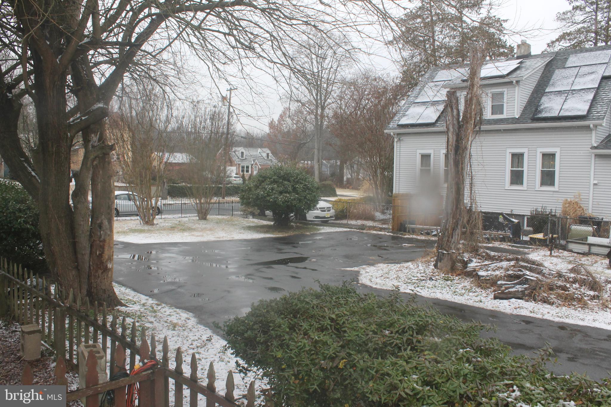 29 Lincoln Avenue Clementon, NJ 08021 - Photo 6 of 36 a view of a house with snow on the background