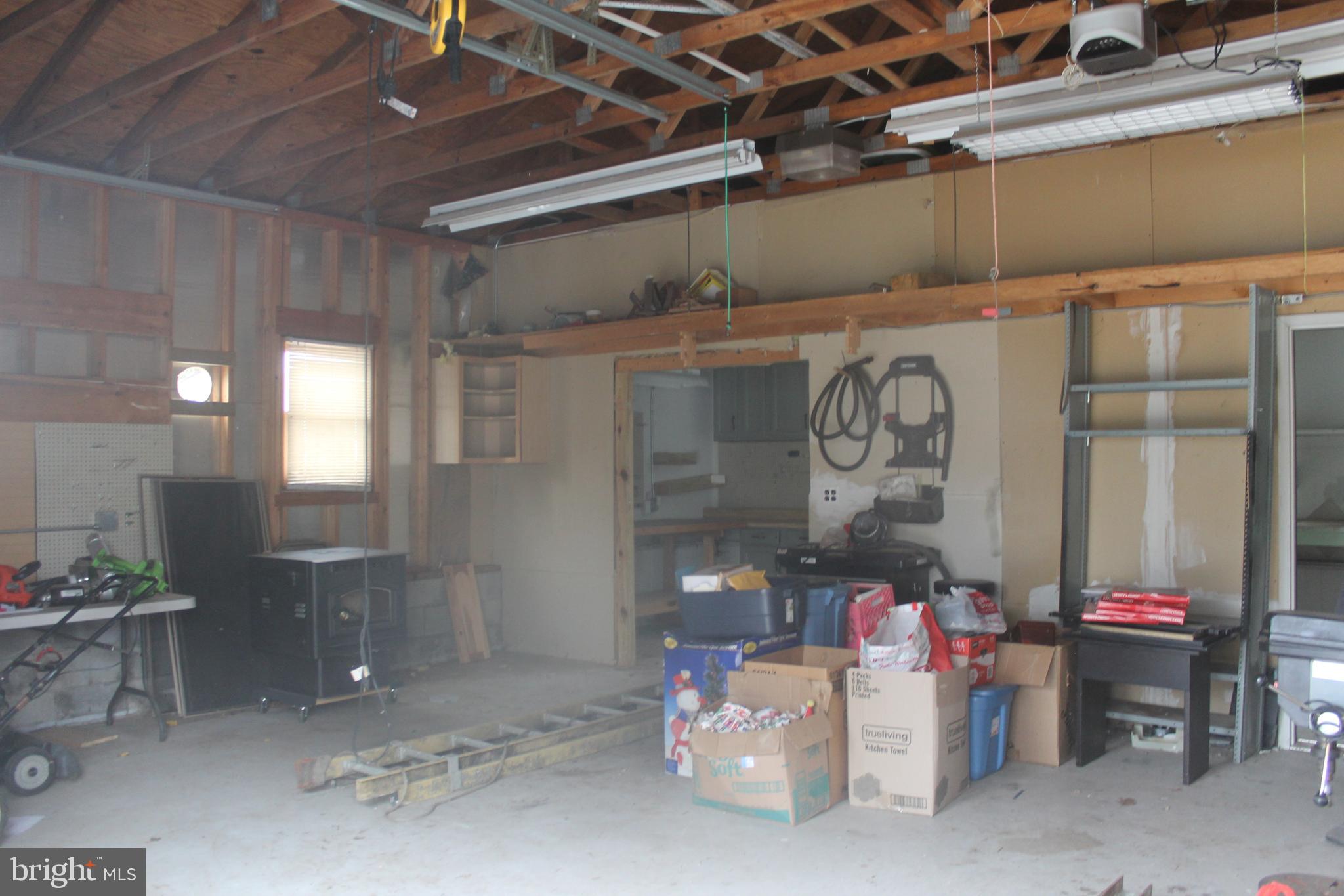 29 Lincoln Avenue Clementon, NJ 08021 - Photo 10 of 36 a room with lots of storage and a white table