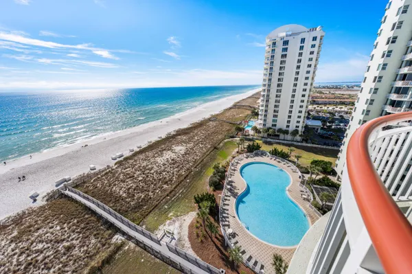 a view of a balcony with an ocean view