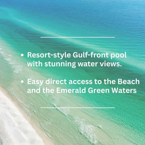 a view of a swimming pool with an ocean view