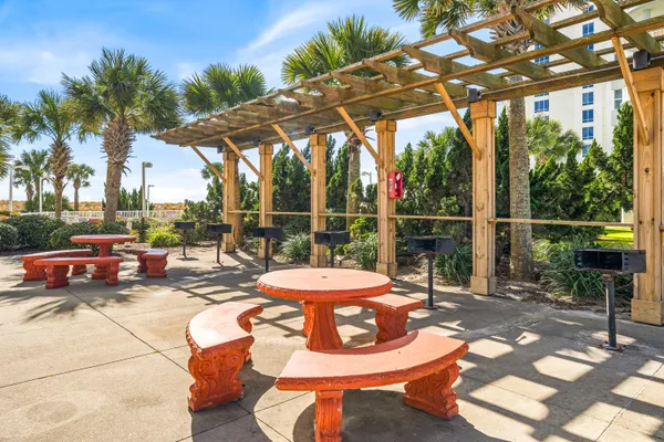 a view of a patio with swimming pool