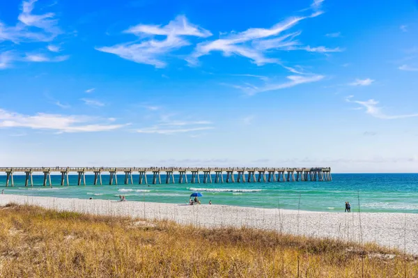 a view of a golf course with a lake