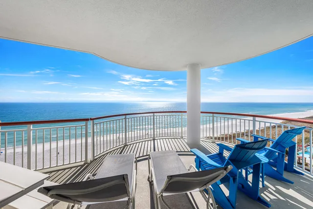 a view of a balcony with chairs