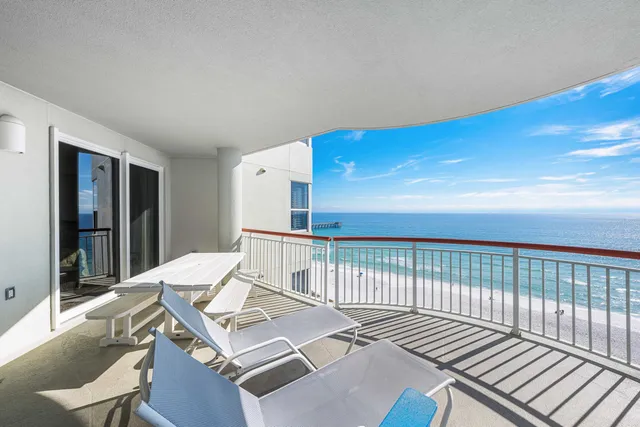 a view of a patio with wooden floor