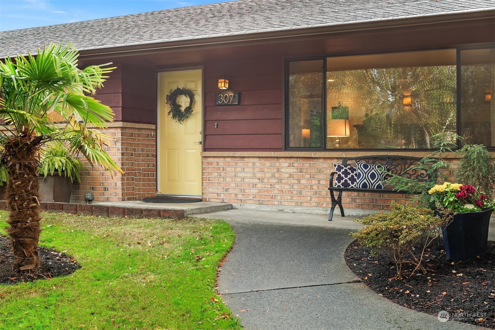 307 Elm Street Everett, WA 98203 - Photo 1 of 31 a front view of a house with garden