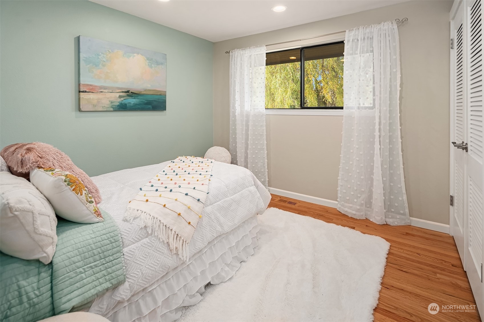 307 Elm Street Everett, WA 98203 - Photo 24 of 31 a bedroom with a bed and a window