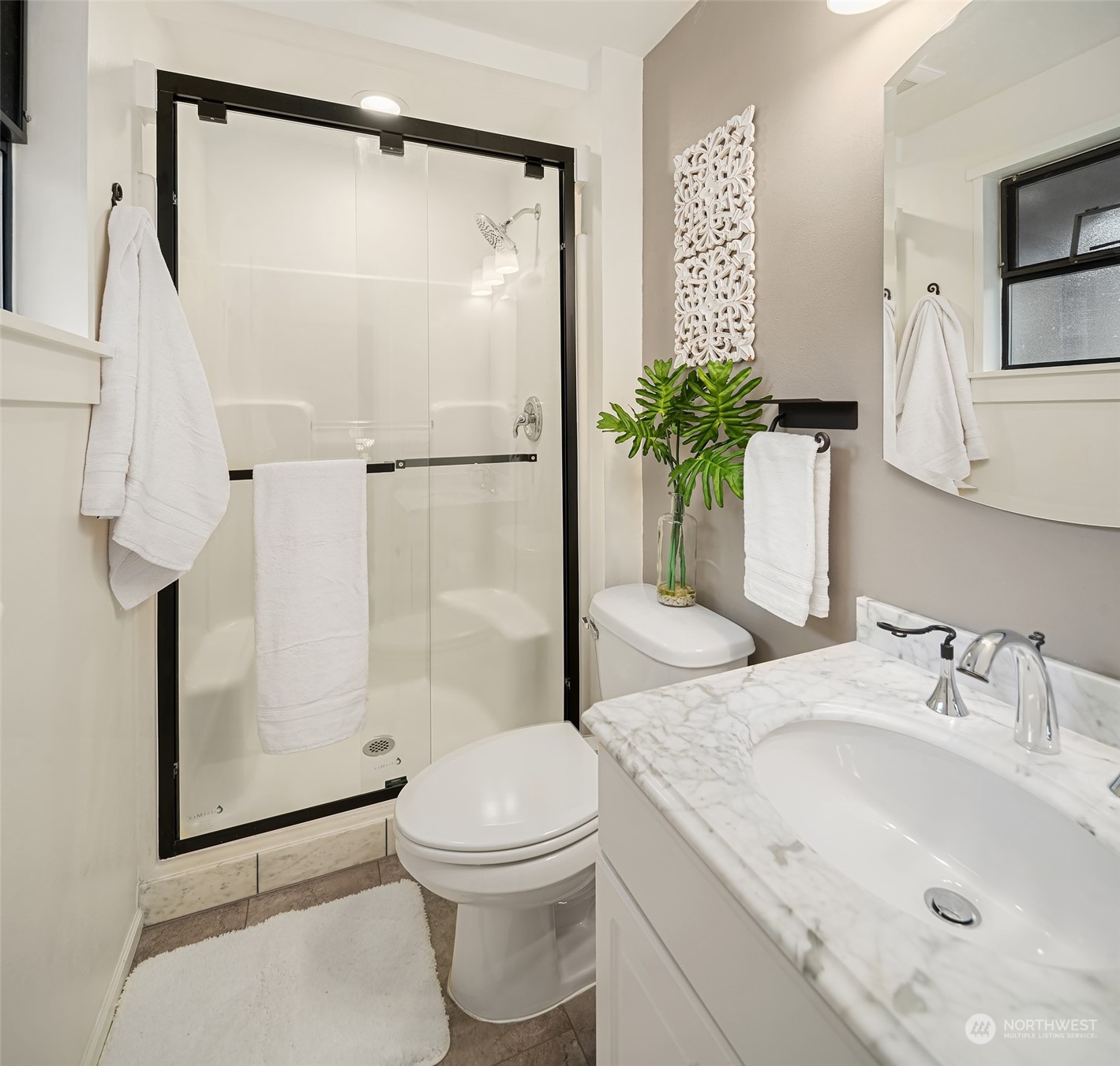 307 Elm Street Everett, WA 98203 - Photo 27 of 31 a bathroom with a granite countertop sink toilet and shower