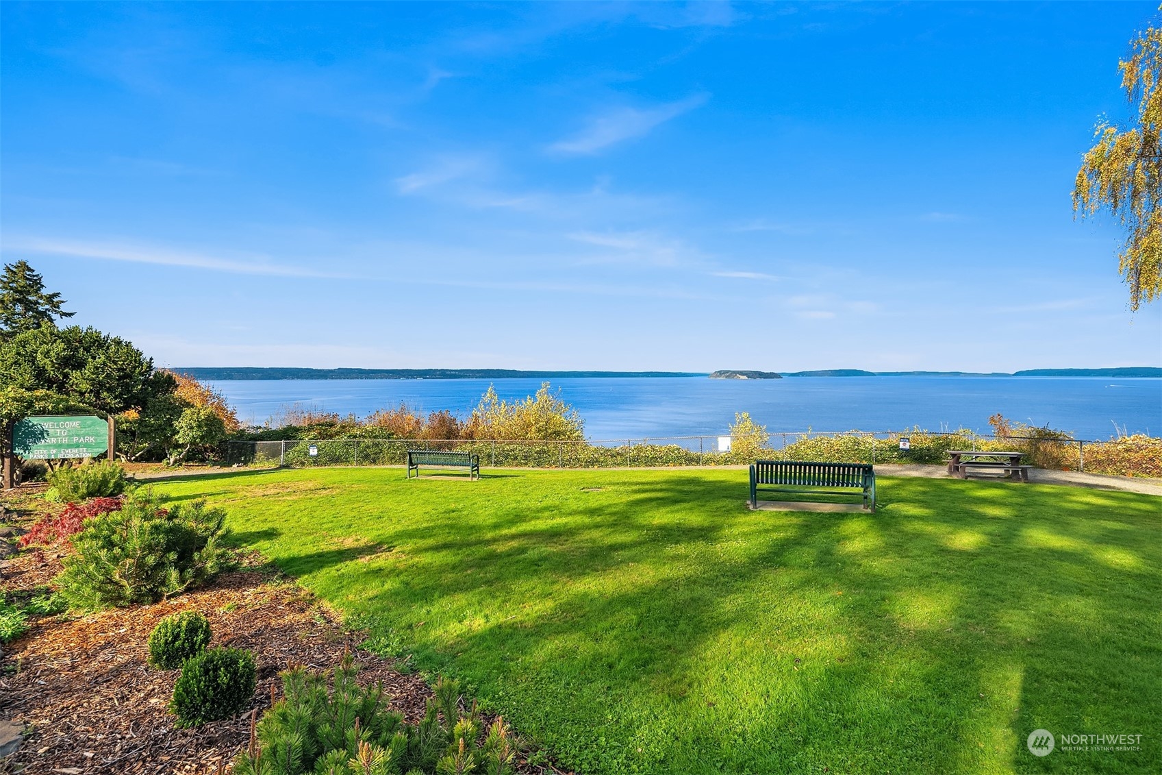 307 Elm Street Everett, WA 98203 - Photo 31 of 31 a view of an ocean and trees in the background