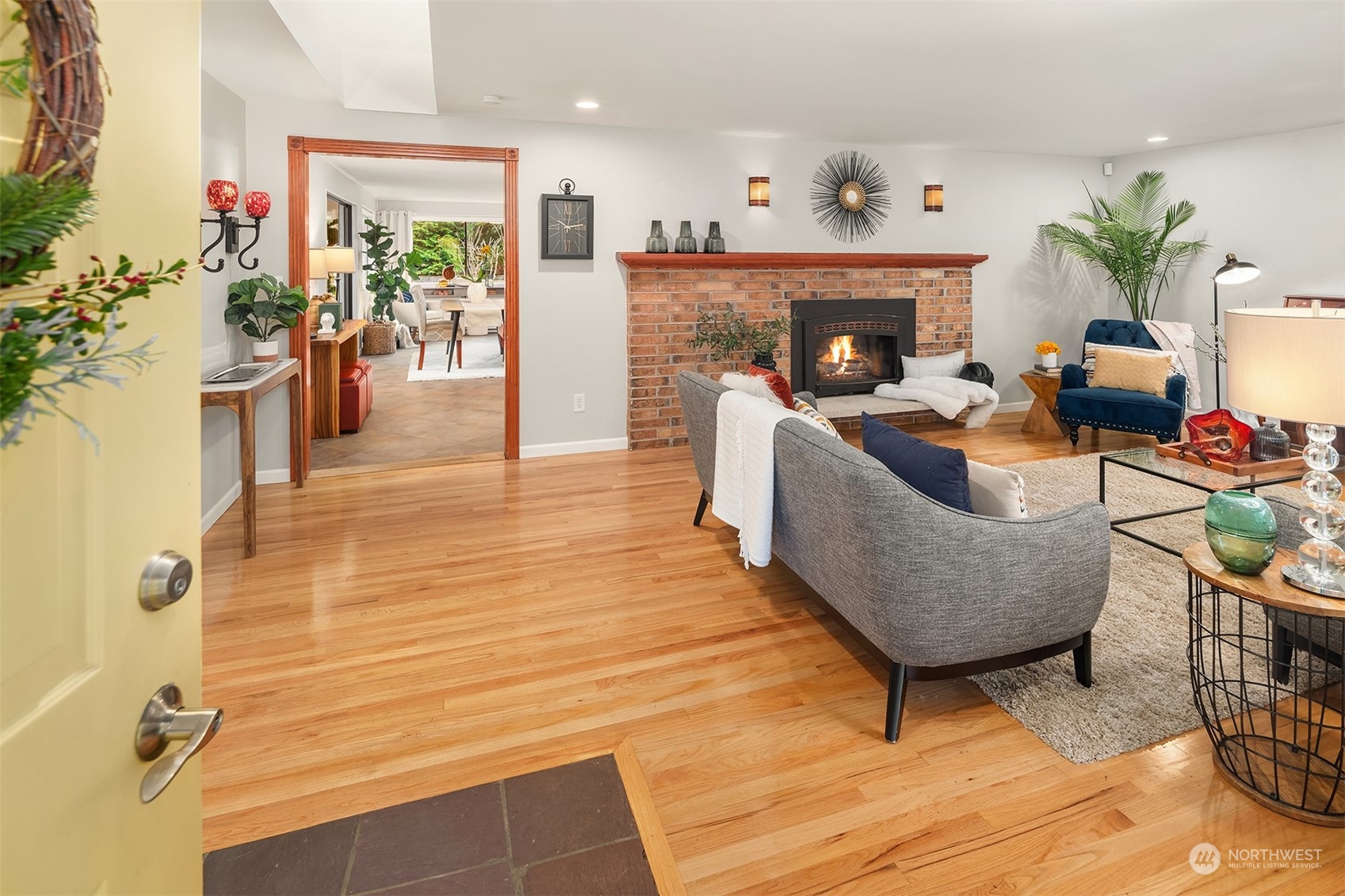 307 Elm Street Everett, WA 98203 - Photo 6 of 31 a living room with furniture and a fireplace