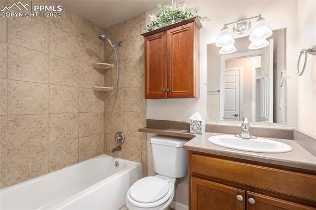 4514 Ridgeglen Road Colorado Springs, CO 80918 - Photo 12 of 29 Full bathroom with vanity and tub / shower combination