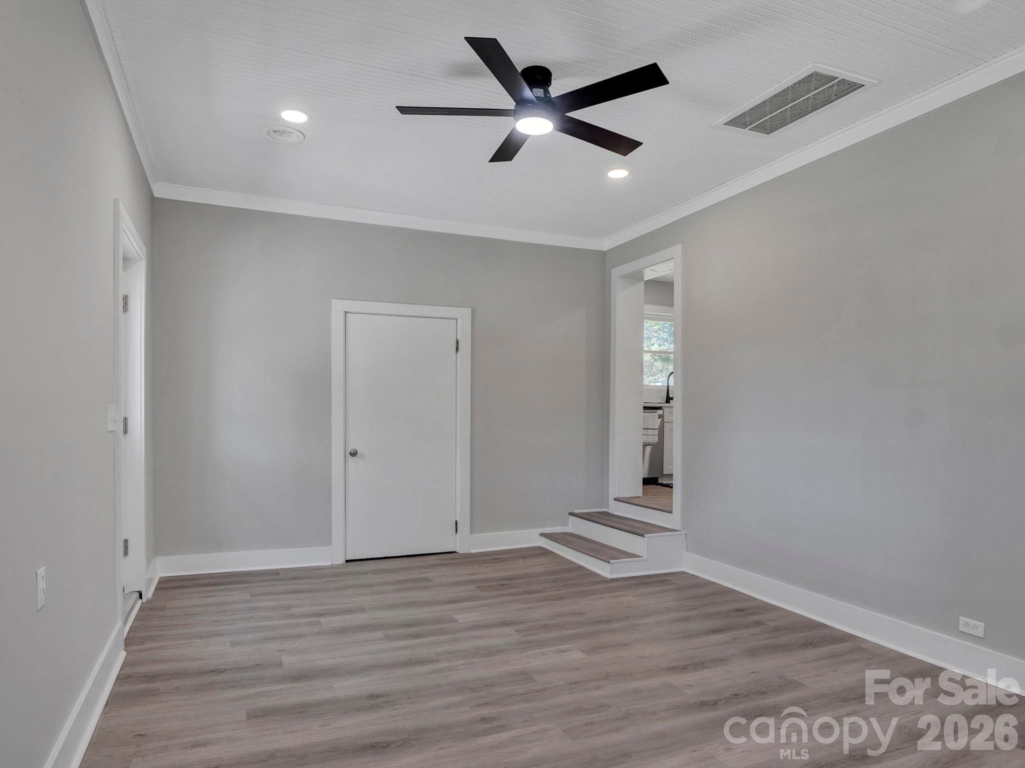 2826 State Rd S-29-656 Lancaster, SC 29720 - Photo 12 of 31 wooden floor in an empty room with a window