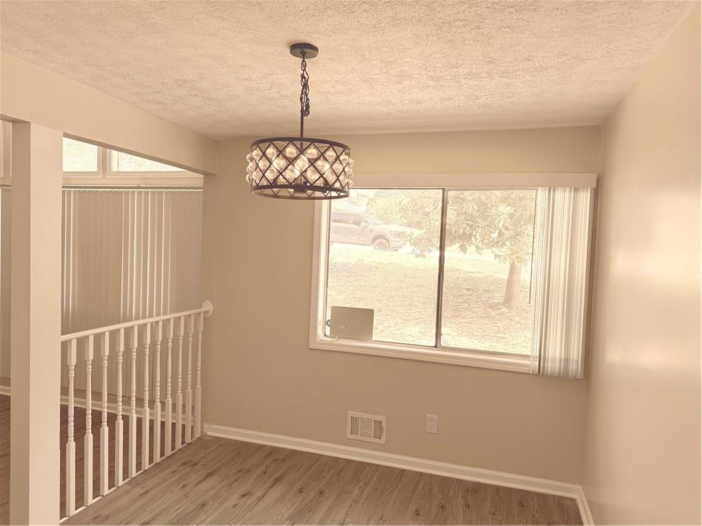 4707 Riverwood Circle Decatur, GA 30035 - Photo 5 of 17 a view of an empty room with a window
