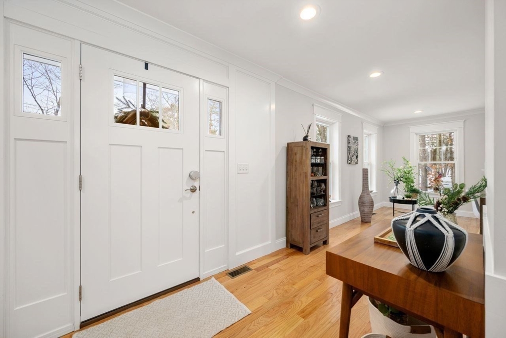 367 Powder Mill Road Concord, MA 01742 - Photo 3 of 42 a view of a livingroom with furniture and window