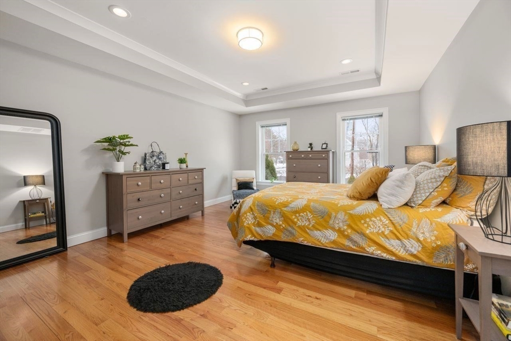 367 Powder Mill Road Concord, MA 01742 - Photo 38 of 42 a spacious bedroom with a bed and window