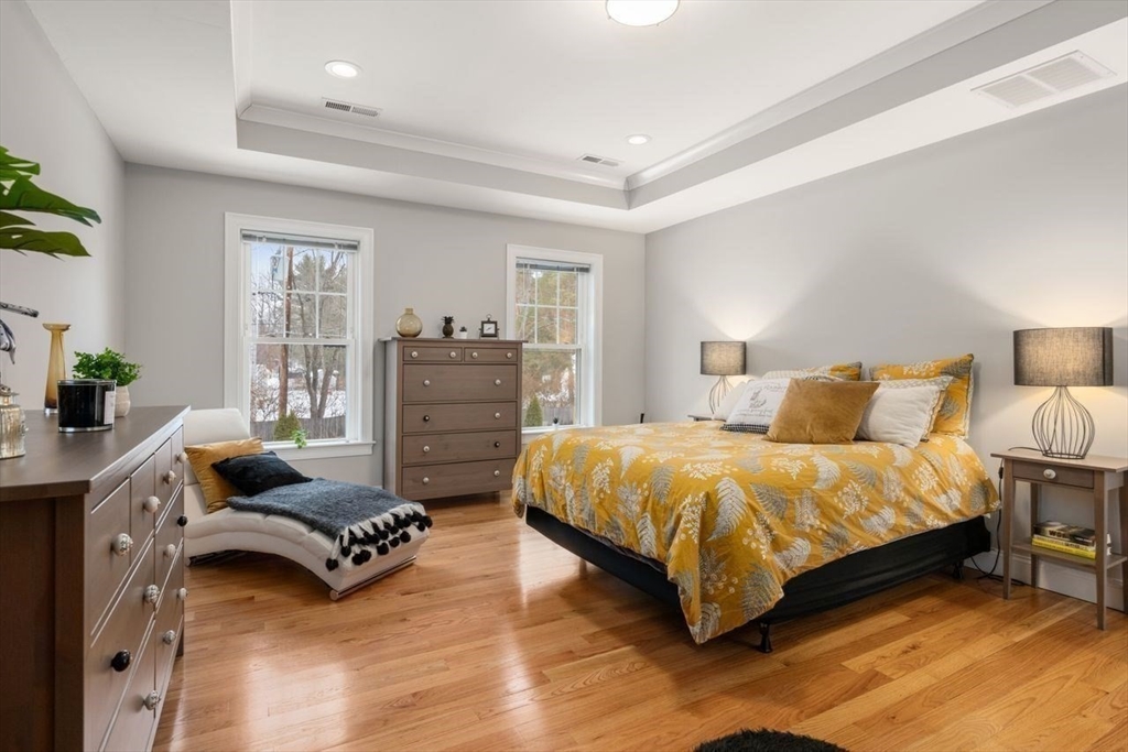 367 Powder Mill Road Concord, MA 01742 - Photo 39 of 42 a spacious bedroom with a bed and furniture