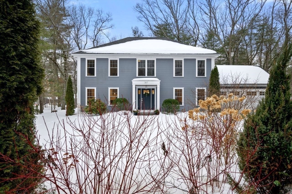 367 Powder Mill Road Concord, MA 01742 - Photo 42 of 42 a front view of a house with a yard
