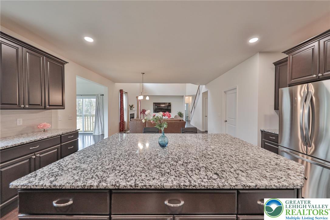 338 Abby Road Macungie, PA 18062 - Photo 14 of 40 a kitchen with large counter top and refrigerator