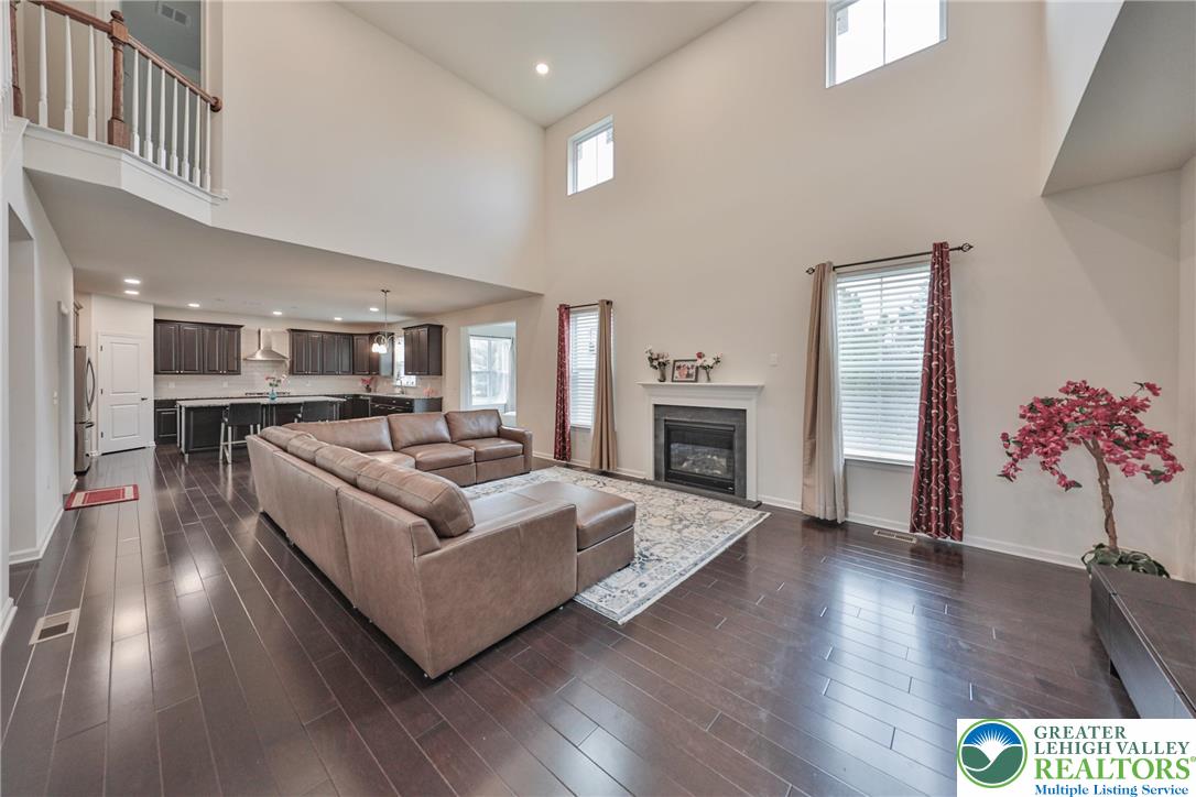 338 Abby Road Macungie, PA 18062 - Photo 22 of 40 a living room with furniture and a fireplace
