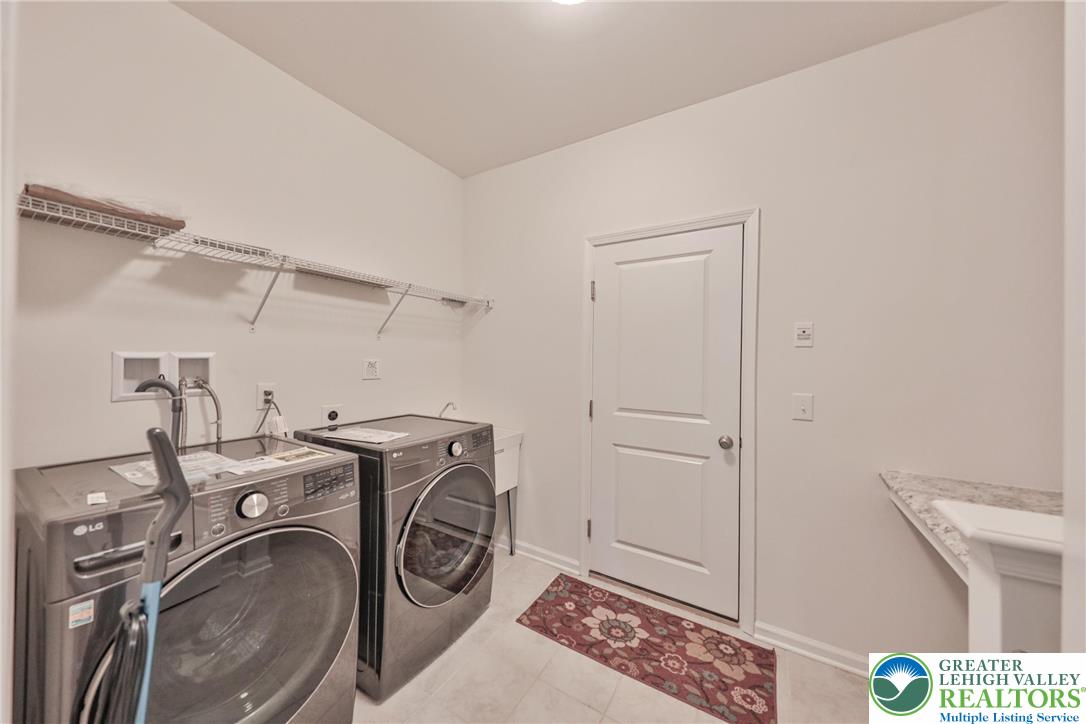 338 Abby Road Macungie, PA 18062 - Photo 26 of 40 a utility room with dryer and washer