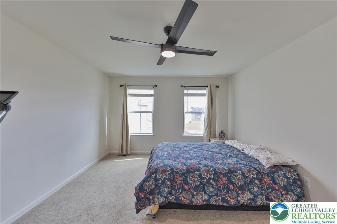 338 Abby Road Macungie, PA 18062 - Photo 30 of 40 a bedroom with a bed and window