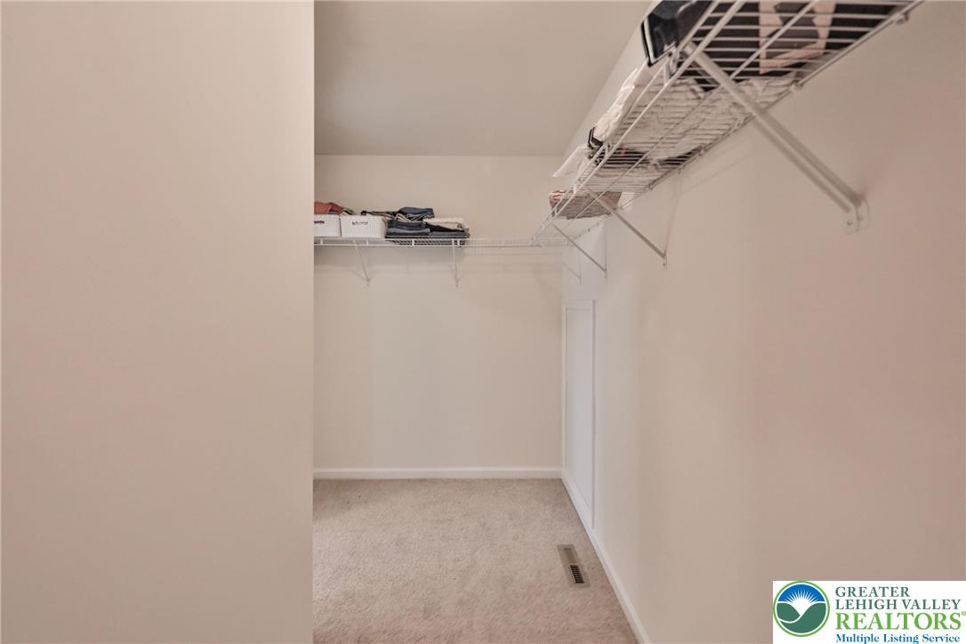 338 Abby Road Macungie, PA 18062 - Photo 32 of 40 a view of walk in closet with empty racks