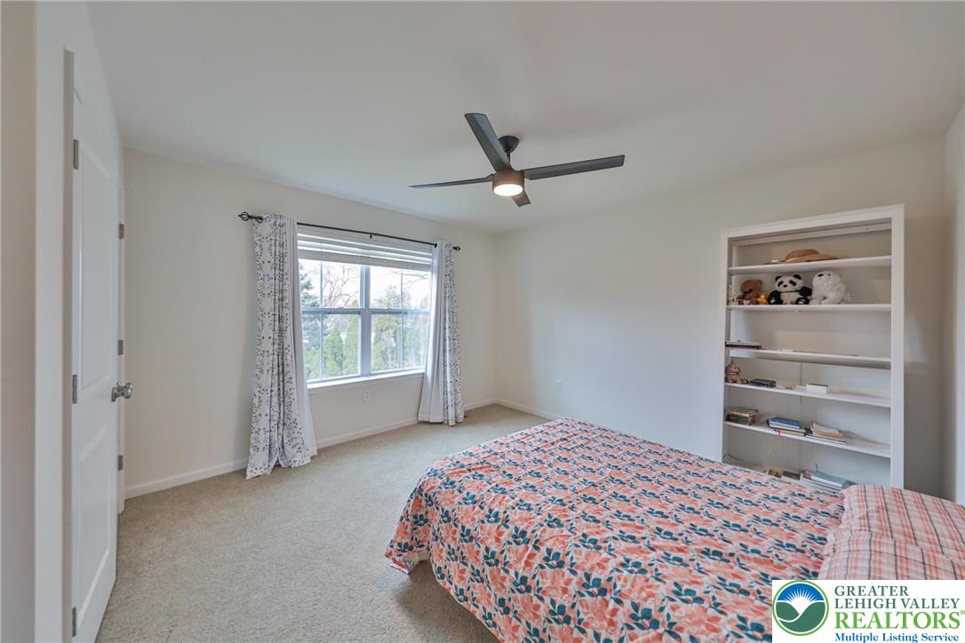 338 Abby Road Macungie, PA 18062 - Photo 35 of 40 a bedroom with a bed and a window