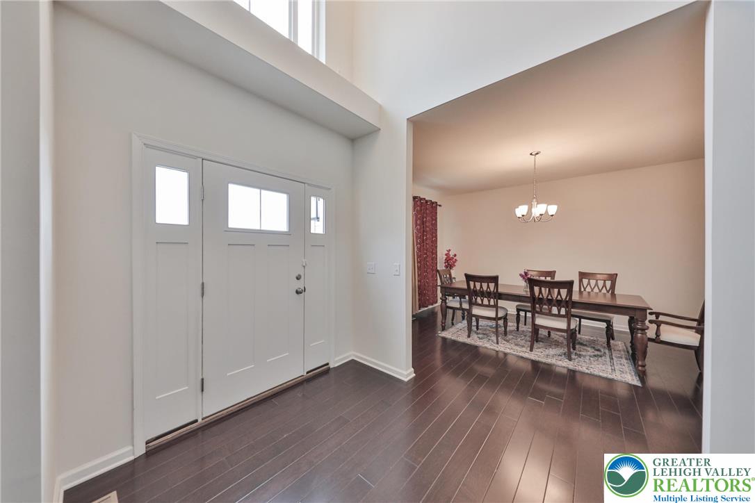 338 Abby Road Macungie, PA 18062 - Photo 5 of 40 a view of a dining room with furniture and wooden floor