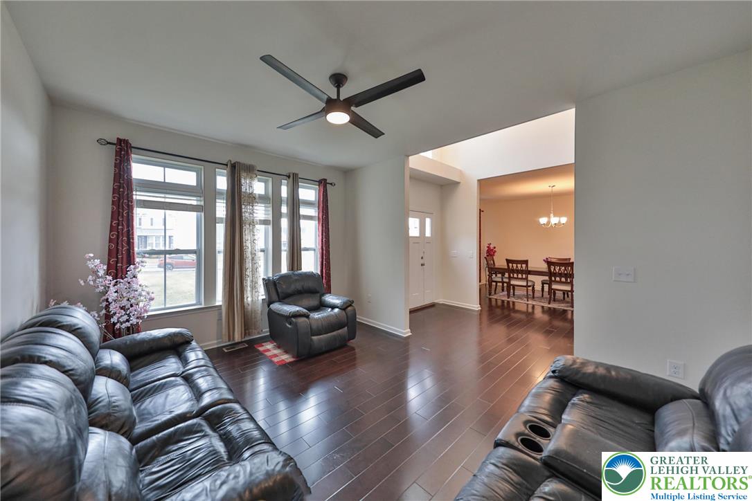338 Abby Road Macungie, PA 18062 - Photo 7 of 40 a living room with furniture and a large window
