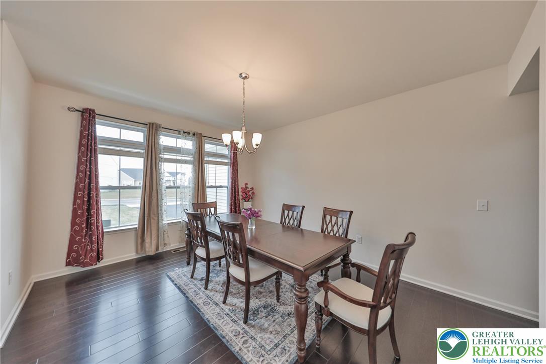 338 Abby Road Macungie, PA 18062 - Photo 8 of 40 a view of a dining room with furniture window and wooden floor