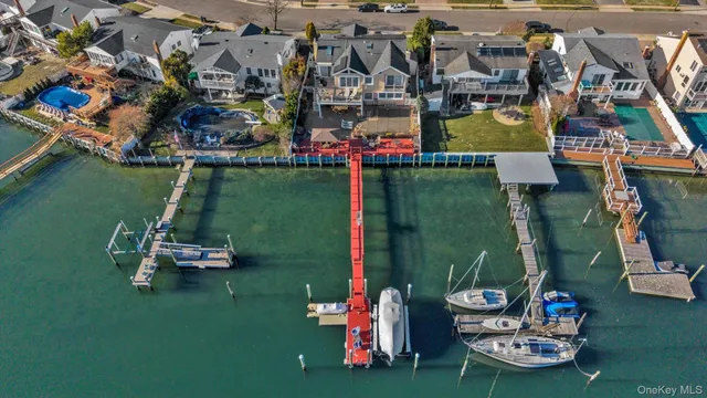 an aerial view of a house with outdoor space