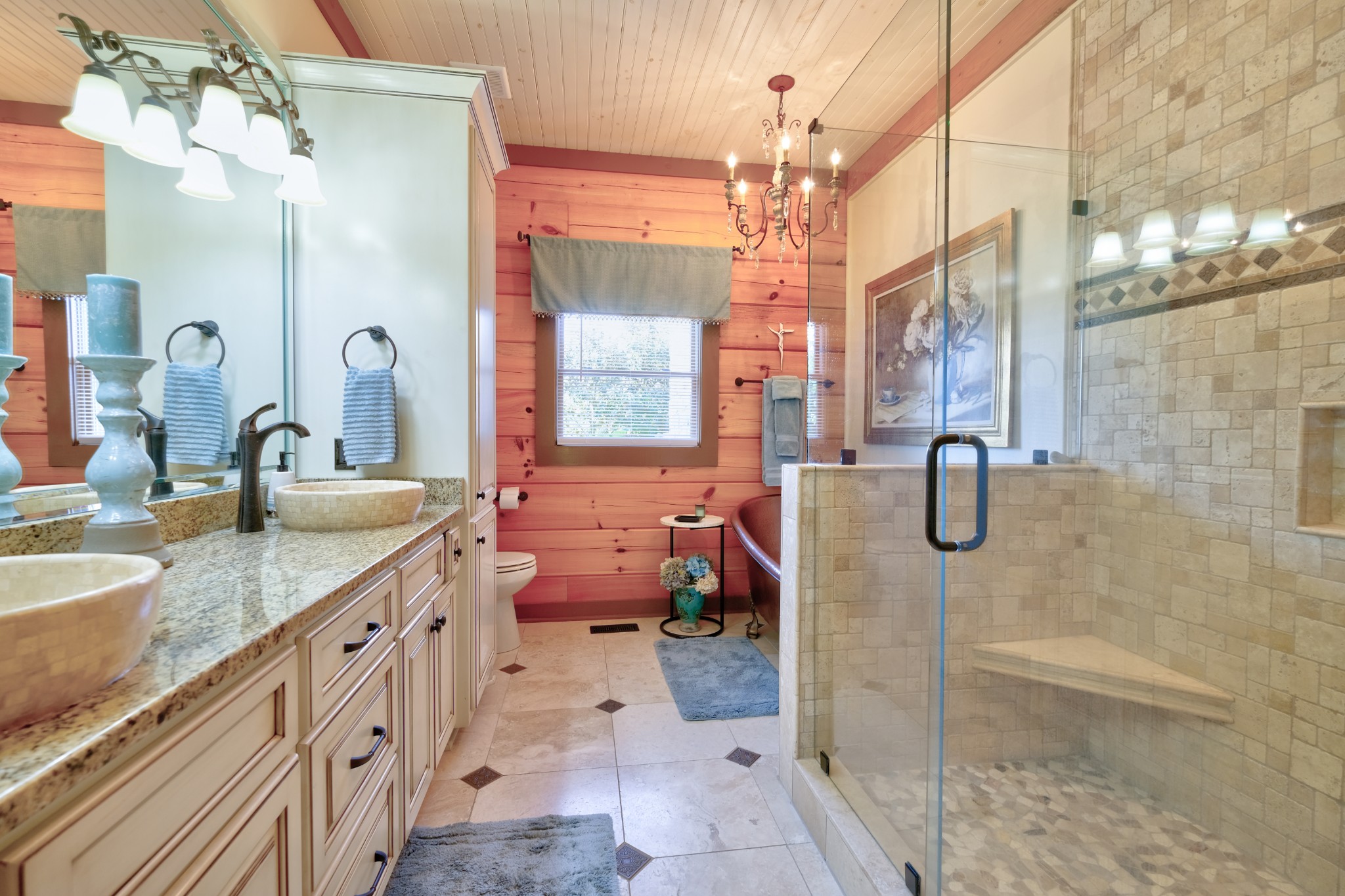 3210 Thompson Road Murfreesboro, TN 37128 - Photo 19 of 42 Tiled primary bath with bench seating in shower and separate copper tub.