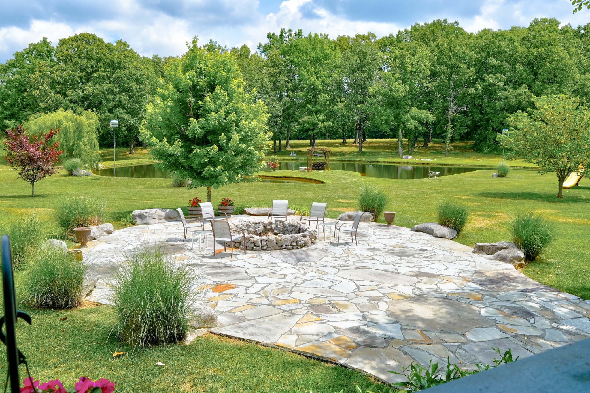 3210 Thompson Road Murfreesboro, TN 37128 - Photo 35 of 42 Flat stone patio with firepit is just one of many outdoor living spaces to enjoy!
