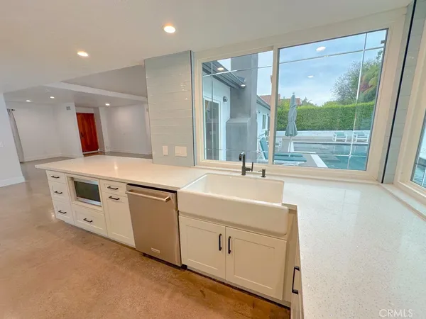 a bathroom with a sink double vanity and a shower