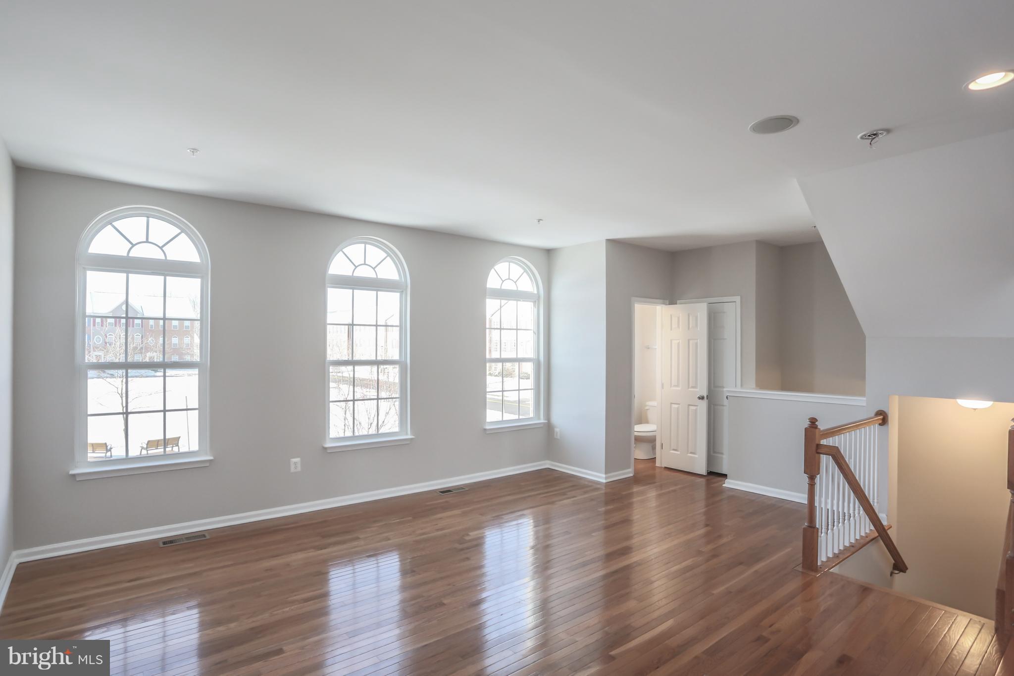 2804 Admiral Ridge Road Accokeek, MD 20607 - Photo 7 of 30 LR with wall of windows & gleaming HWs