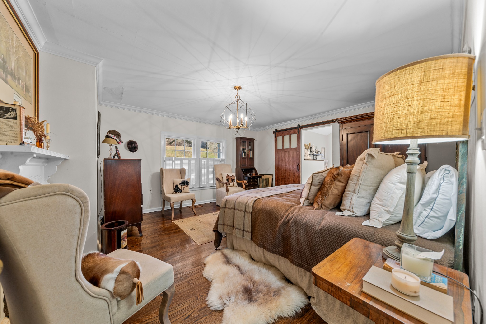 3580 Blue Creek Road Lynnville, TN 38472 - Photo 32 of 90 a living room with furniture a chandelier and a window
