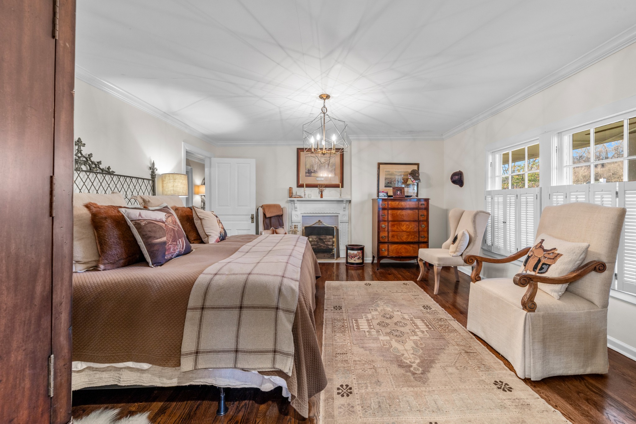 3580 Blue Creek Road Lynnville, TN 38472 - Photo 39 of 90 a bed room with furniture and a fireplace