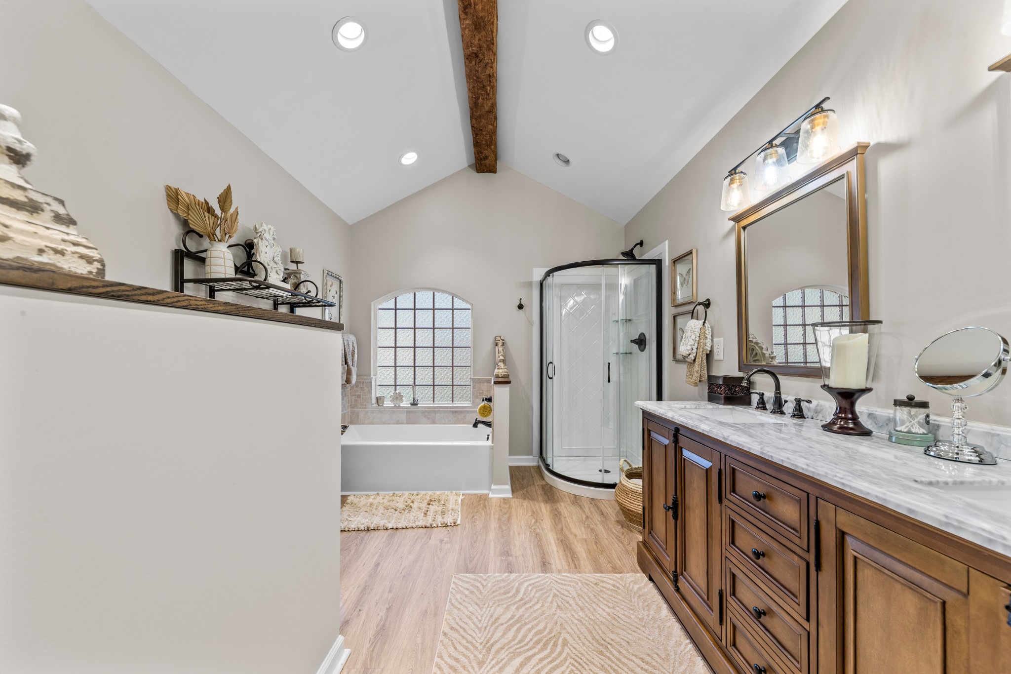 3580 Blue Creek Road Lynnville, TN 38472 - Photo 40 of 90 a bathroom with a double vanity sink a mirror and a bathtub