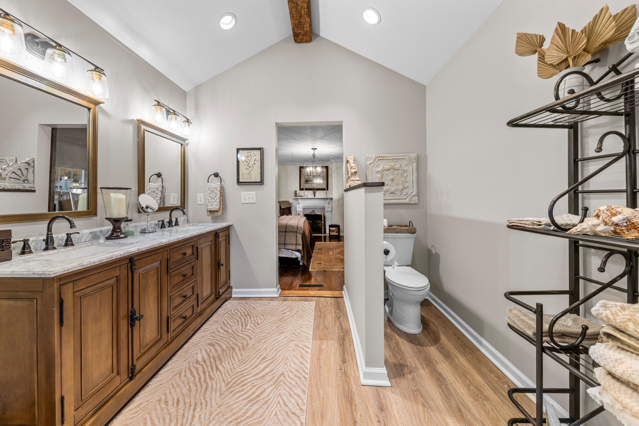 3580 Blue Creek Road Lynnville, TN 38472 - Photo 43 of 90 a spacious bathroom with a double vanity sink a toilet and a mirror