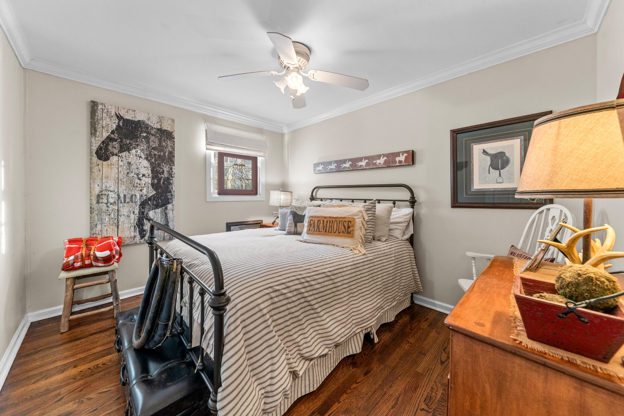 3580 Blue Creek Road Lynnville, TN 38472 - Photo 44 of 90 a bedroom with bed and a chandelier